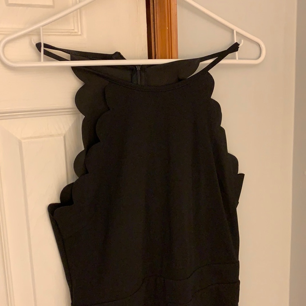Scalloped high neck jumpsuit with pockets